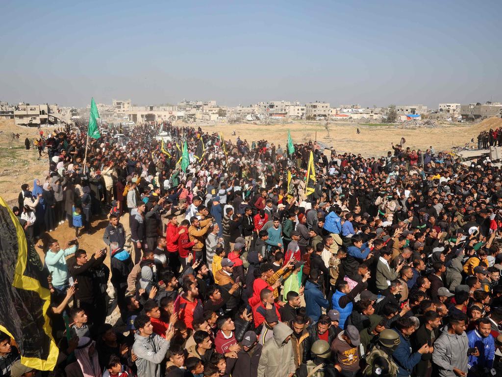 These are the crowds that Israel said were pushing and shoving as seven hostages, two Israelis and five Thais, were released by Hamas to the Red Cross. Picture: AFP