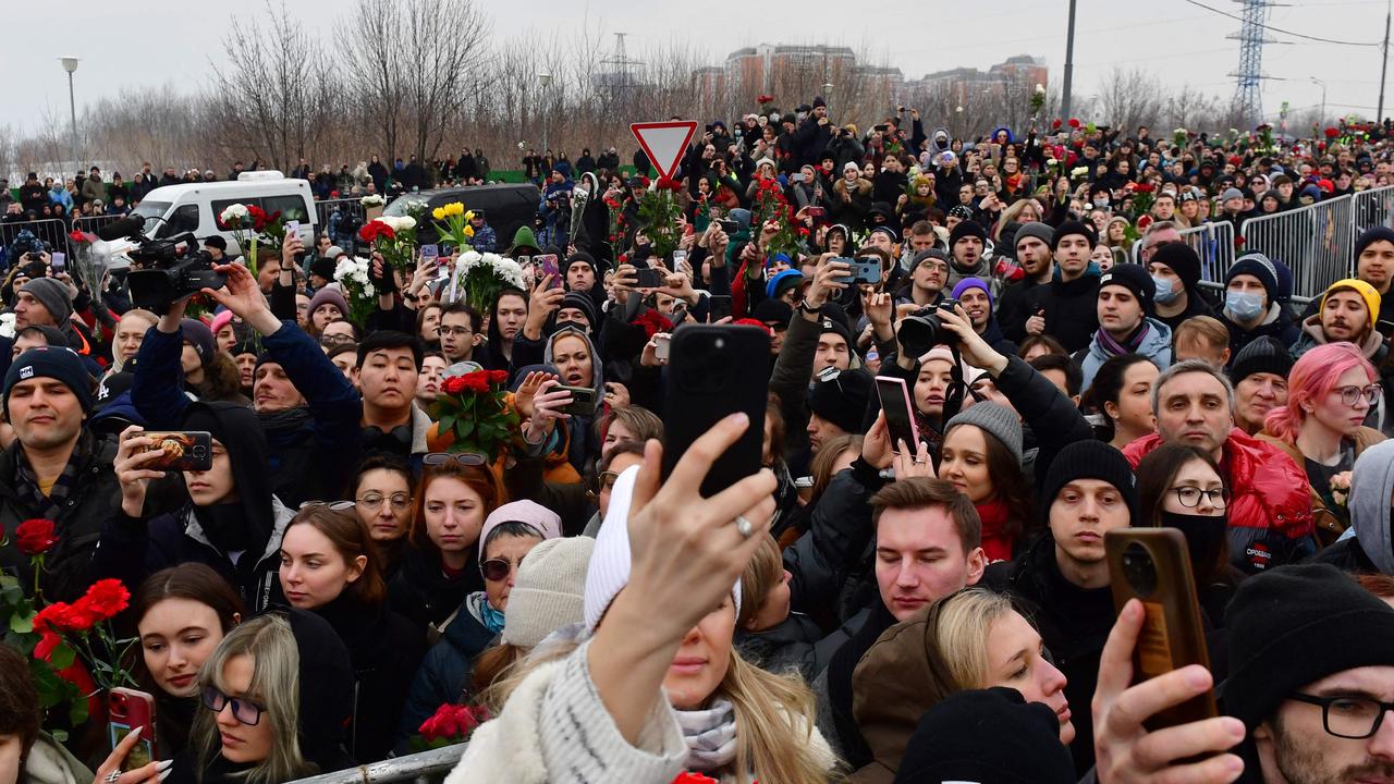 Mourners attend a funeral ceremony for late Russian opposition leader Alexei Navalny at the Borisovo cemetery in Moscow's district of Maryino on March 1, 2024. (Photo by Olga MALTSEVA / AFP)