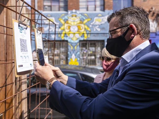 Premier Daniel Andrews checks in with a QR code.