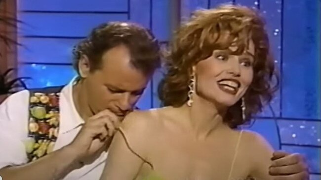 Bill Murray tried to lower Geena Davis’ dress strap during a promo segment. Picture: Arsenio Hall Productions