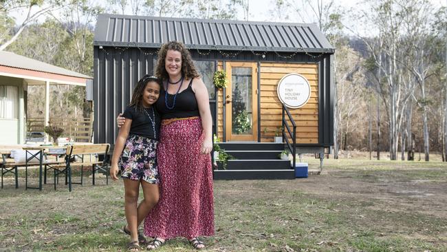 Nina Jongen and daughter Miwanyo with their Aussie Tiny Houses. Picture: Matthias Engesser