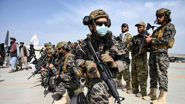 Members of the Taliban Badri 313 military unit take a position at the airport in Kabul on August 31. Picture: AFP