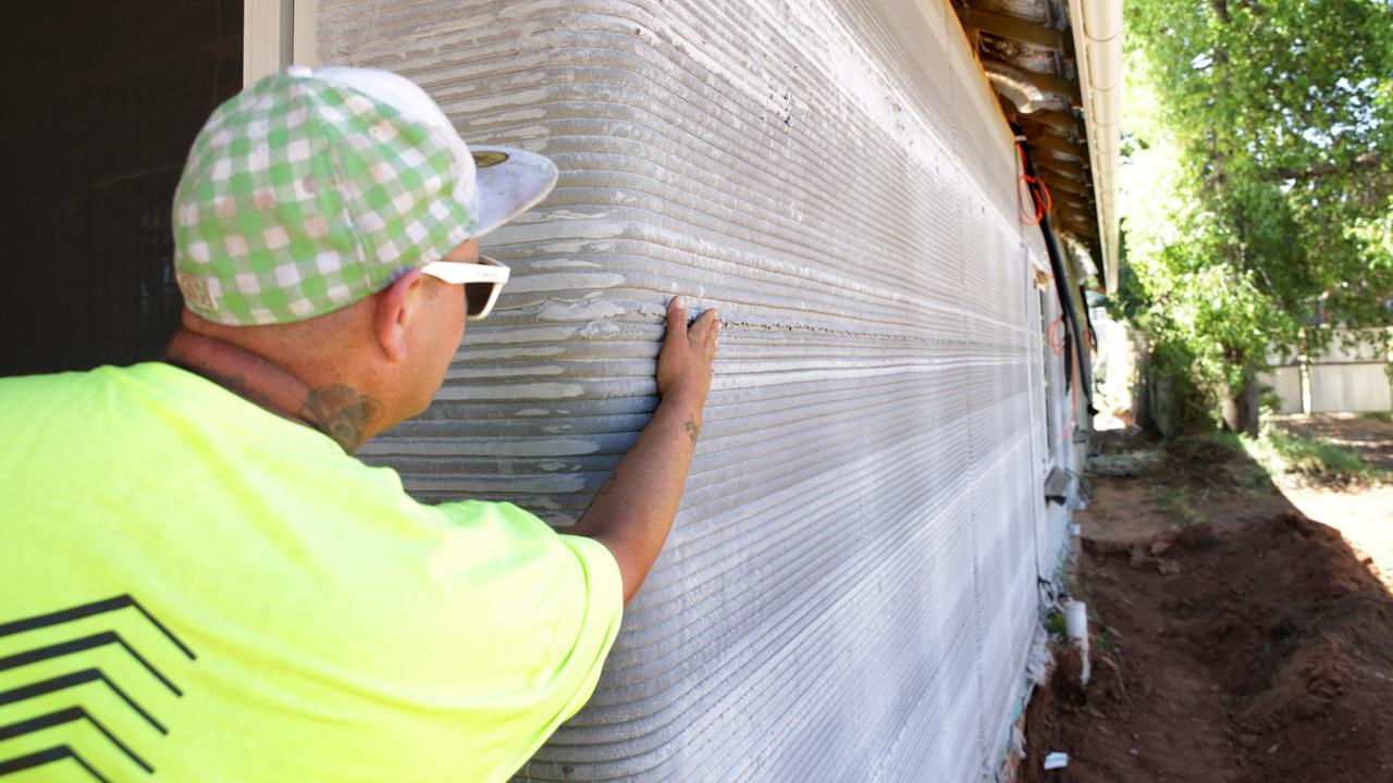 Tom Cubby from Crete-tech working on the 3D-printed duplex walls. Picture: Dean Marzolla