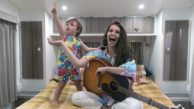 Country singer-songwriter Fanny Lumsden and her son Walter, 3, in her caravan while on tour in Darwin. Picture: Dan Stanley Freeman