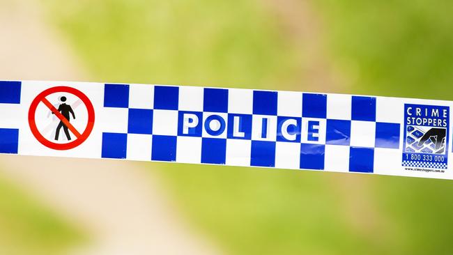 General photograph of Queensland Police and Crime Stoppers tape at crime scene, Sunday, March 8, 2020 (AAP Image/Richard Walker)