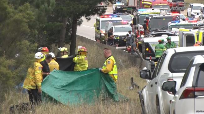 Emergency workers at the scene of the horrific crash on Friday afternoon. Picture: TNV