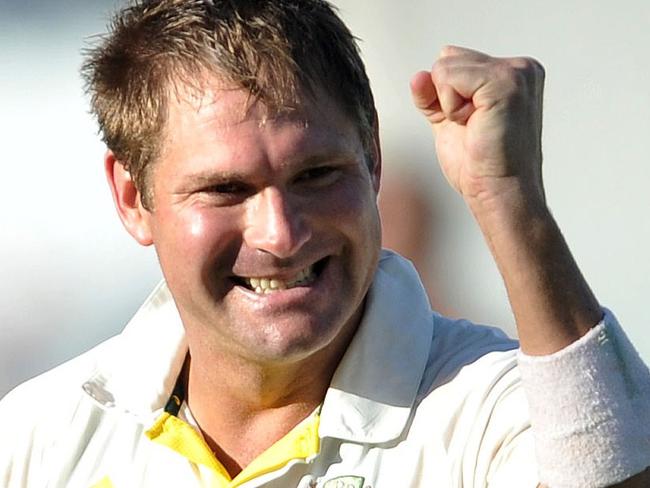 (Files) In this file picture taken on March 5, 2014, Ryan Harris of Australia celebrates on Day 5 of the third Test match between South Africa and Australia at Newlands in Capetown. Veteran Australia fast bowler Ryan Harris announced his retirement from all forms of cricket on Saturday, just four days before the start of the Ashes. The 35-year-old had been left out of Australia's final warm-up match against Essex after suffering a recurrence of the knee trouble that has plagued his career. AFP PHOTO / Luigi Bennett