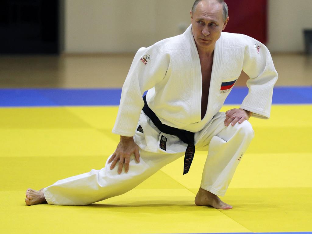 In this file photo taken in February, 2019, Vladimir Putin takes part in a training session with members of the Russian national judo team in Sochi. Picture: Sputnik/AFP