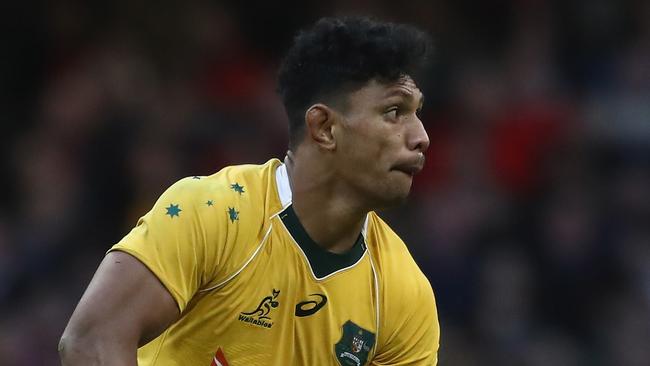 CARDIFF, WALES - NOVEMBER 05: Lopeti Timani of the Australian Wallabies off loads the ball during the International match between Wales and Australia at the Principality Stadium on November 5, 2016 in Cardiff, Wales. (Photo by David Rogers/Getty Images)