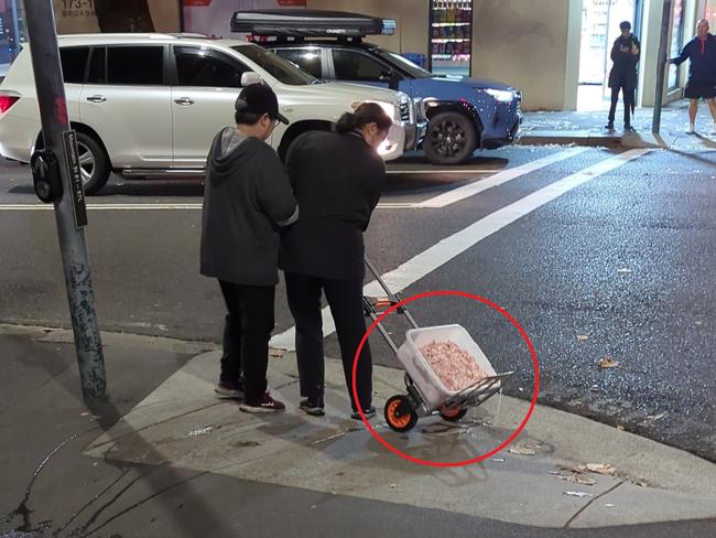 Raw chicken getting carried in the open without any cover by local restaurant spotted near Broadway\Central