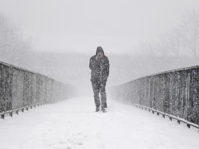 Members of the public make their way through the snow on February 28, in Glasgow, Scotland. Freezing weather conditions dubbed the ‘Beast from the East’ bring snow and sub-zero temperatures to the UK. Amber warnings are in place in northern England, the East Midlands, London, the east and south-east of England. Scotland’s weather warning has been upgraded to red, which means risk to life, widespread damage, travel and power disruption are likely. Picture: Getty Images