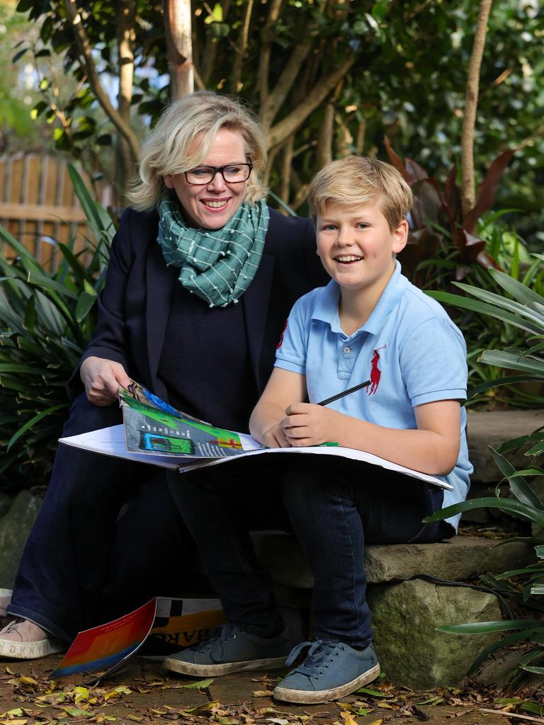 Littlescribe founder and chief executive Jenny Atkinson with son Archie, 11, who takes his mum’s expert advice and writes his stories by hand before typing them up. Picture: Justin Lloyd