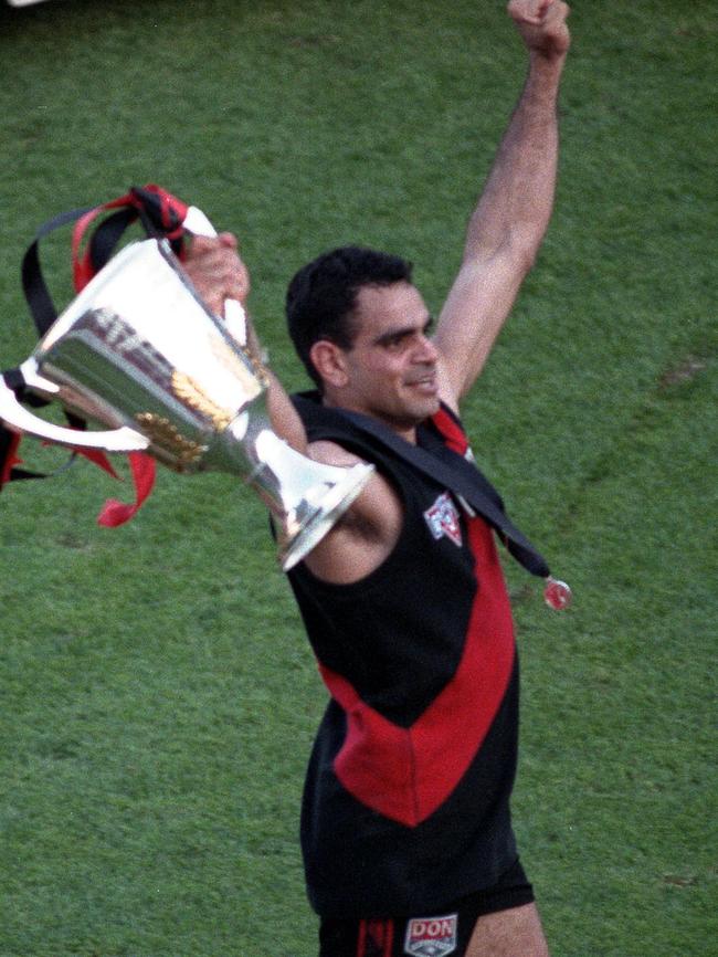 Champion ... Michael Long holds the 1993 premiership cup