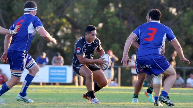 Souths halfback Scott Malolua searches for a hole in the Eastwood defence during the Australian Club Championship match at the weekend.