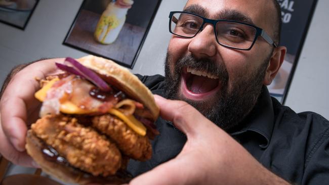 Chef Alvaro Malel with the crumpet burger at The Local Burger Co. Picture: Christopher Chan.