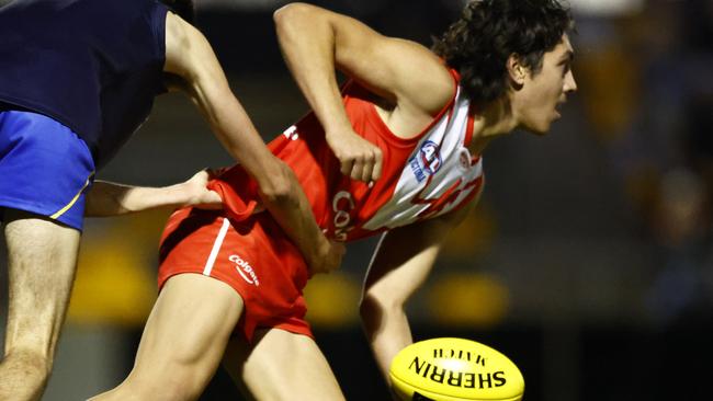 MELBOURNE, AUSTRALIA - MAY 07: Tyreece Leiu of the Young Guns controls the ball while under pressure from Jackson McMenamin of Vic Metro during the AFL Talent Pathway match between Young Guns and Vic Metro U18 at Avalon Airport Oval on May 07, 2022 in Melbourne, Australia. (Photo by Mike Owen/AFL Photos/via Getty Images )