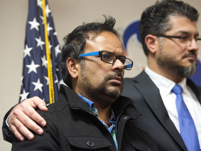 Farhan Khan, left, brother-in-law of one of the suspects involved in a shooting in San Bernardino. Picture: Matt Masin/The Orange County Register via AP