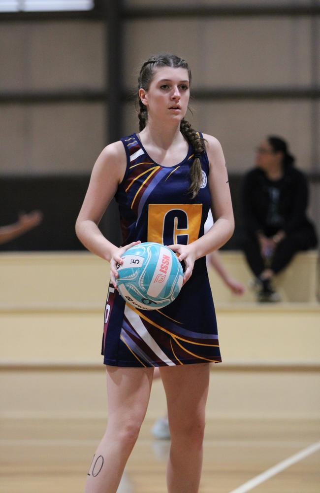 Netball action at QISSN 2024. Canterbury College v Good Shepherd Lutheran College