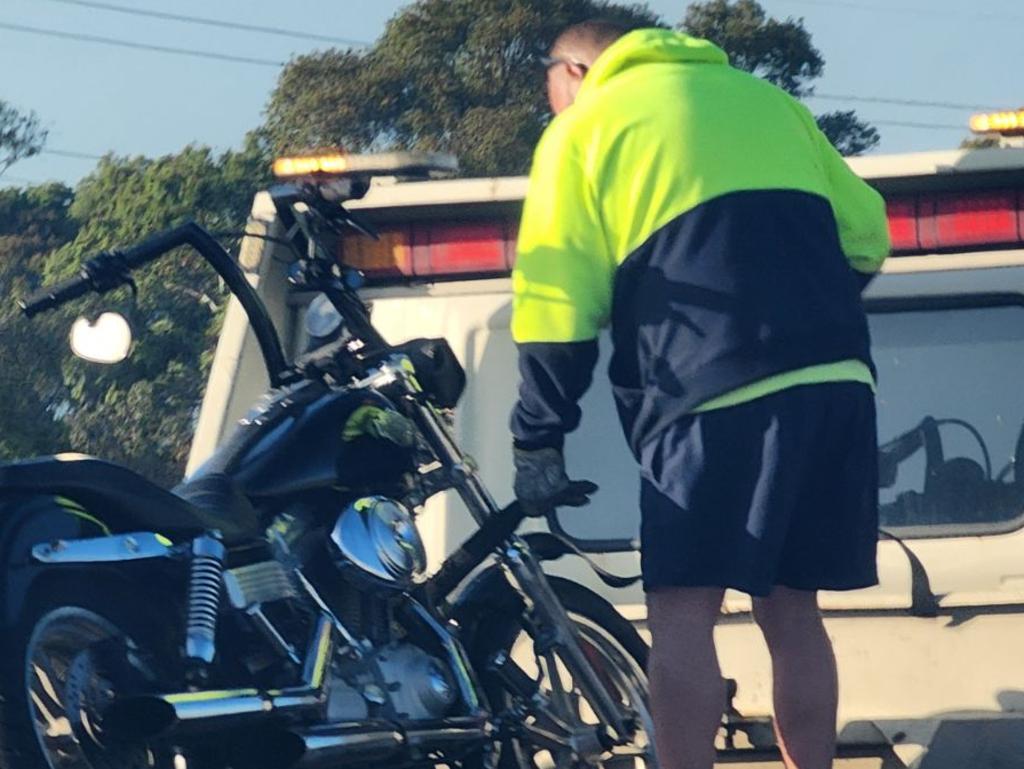 Emergency services take away the motorbike. Picture: Leah Smith