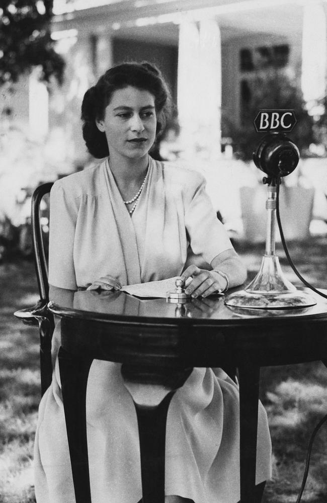 Then Princess Elizabeth makes a broadcast from the gardens of Government House in Cape Town, South Africa, for her 21st birthday, on April 21 1947. In it, she pledged her service to the British Commonwealth and Empire. Picture: Getty Images