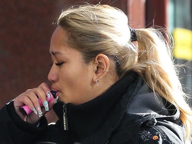 SYDNEY, AUSTRALIA - Newswire Photos -MAY 02 2023:  A general view of people seen vaping in the CBD in Sydney as Governmentâs plans to reduce smoking and stamp out recreational vaping â particularly among young Australians â through stronger legislation, enforcement, education and support. The 2023â24 budget will include $234m to fund new measures to protect Australians against the harm caused by tobacco and vaping products. Picture: NCA Newswire / Gaye Gerard