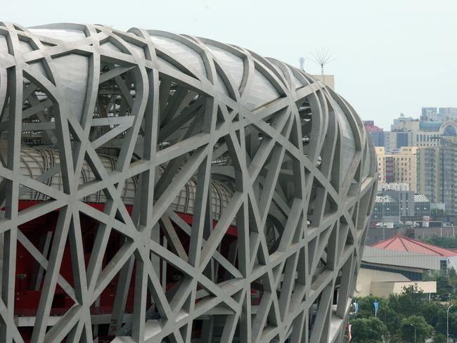 The Chinese economy has been growing 7.7 per cent year on year — phenomenal growth compared to most other developed nations. Pictured, the National Stadium in Beijing.