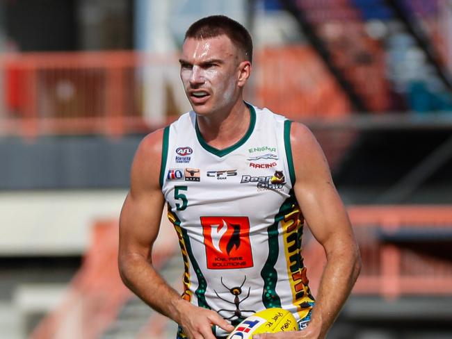 Thomas Schott playing for PINT in the 2024-25 NTFL season. Picture: Celina Whan / AFLNT Media