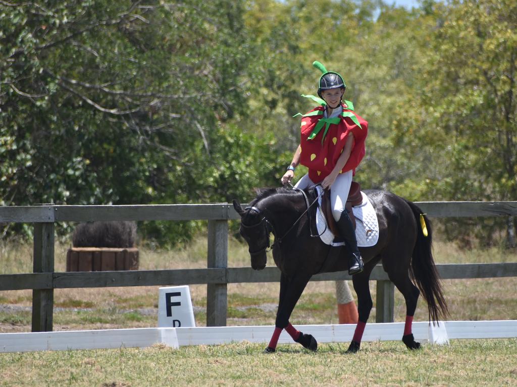 Katie Maund as Watermelon from the Hungry, Hungry Caterpillar competing at Mackay North Pony Club's dressage teams competition, November 6, 2021. Picture: Matthew Forrest