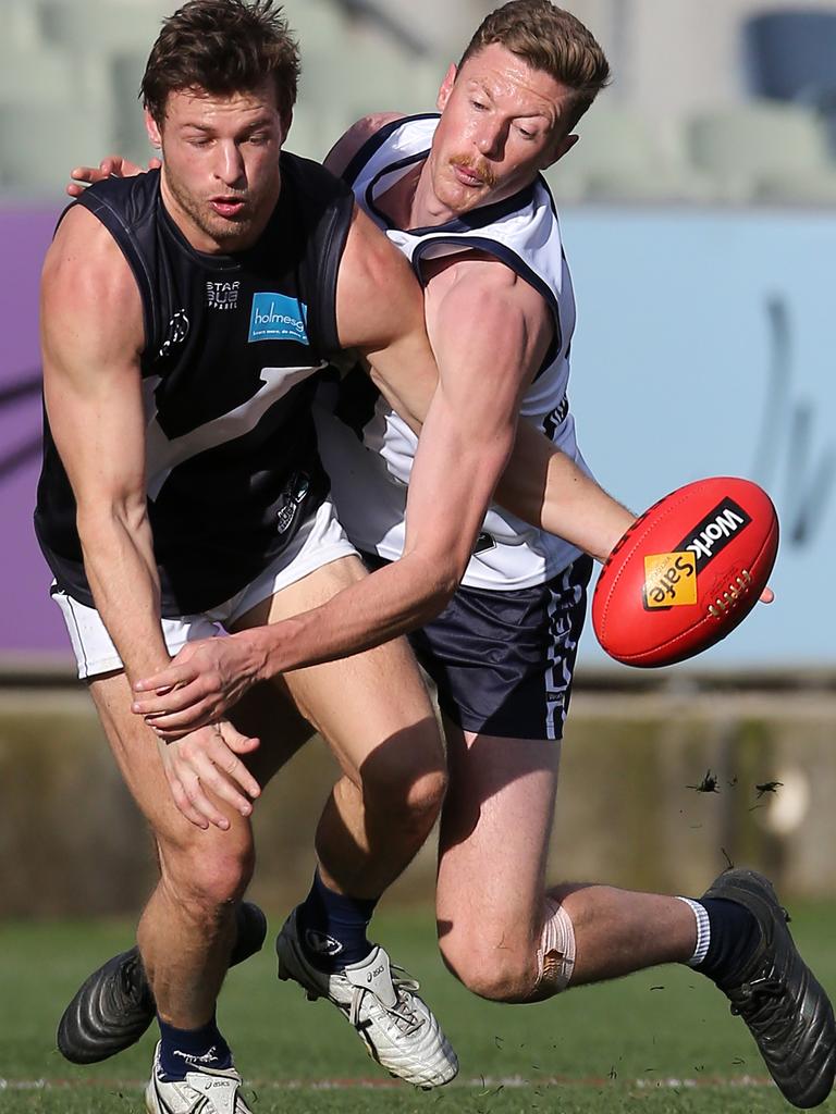 Vic Country’s Brad Ryan and VAFA’s Nicholas Wood at Ikon Park, Carlton. Picture: Yuri Kouzmin