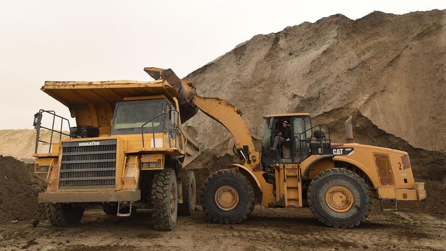 The expansion of mining – especially in WA – has seen more and more staff required. Picture: AFP PHOTO / FETHI BELAID