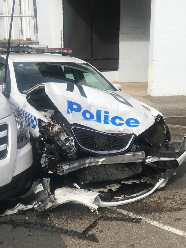 The van crashing into this police car is where it all came undone. Picture: NSW Police Media