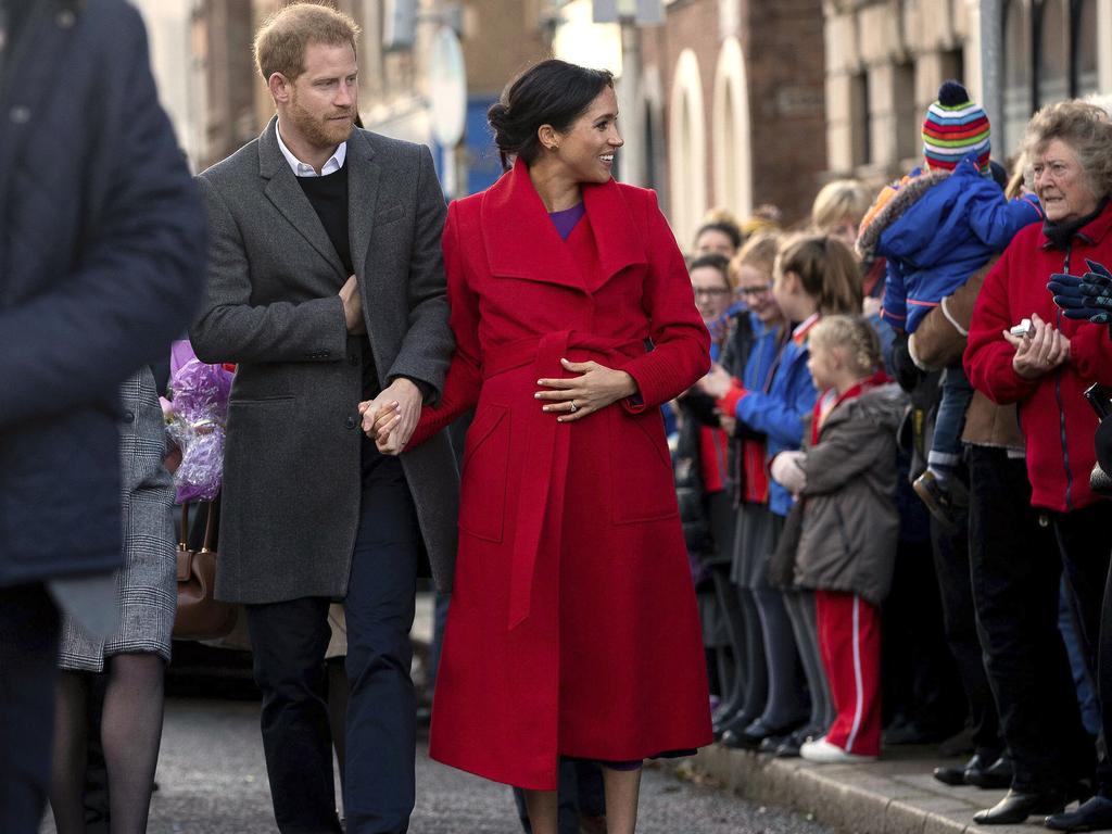 The royal couple was met by throngs of excited fans in the town Birkenhead, northwest England. Picture: Charlotte Graham/AP