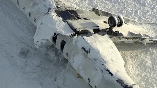 All 80 people on board a Delta Airlines flight survived when it flipped during landing at Toronto Pearson Airport. Picture: CTV via AP