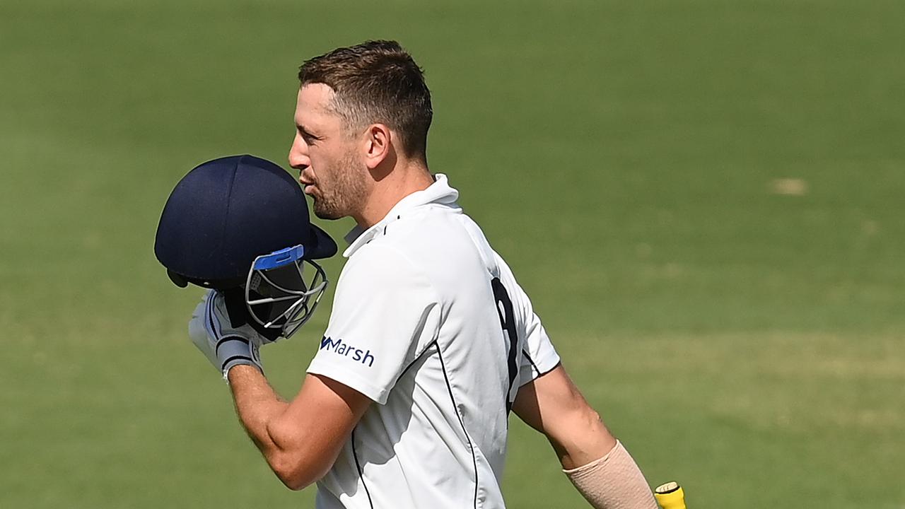 Matthew Short of Victoria celebrates his century. Photo by Quinn Rooney/Getty Images