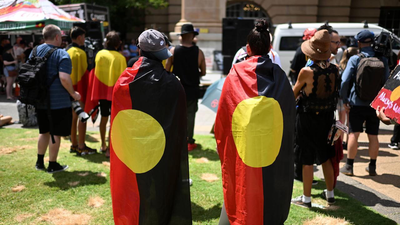 Protesters take part in an Invasion Day rally and march in Brisbane, coinciding with Australia Day. Picture: NCA Newswire / Dan Peled