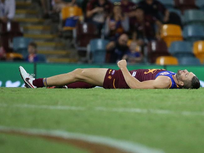Stefan Martin was out cold after Steven May’s crude bump. Pic Jono Searle.