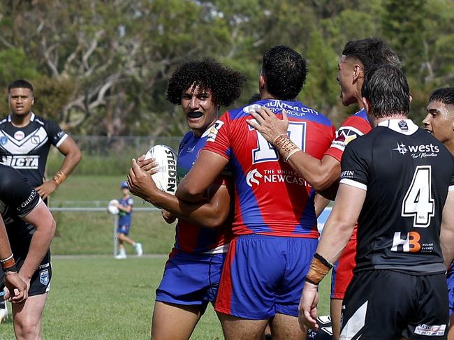 Noah Sefo celebrates his try. Picture: Michael Gorton