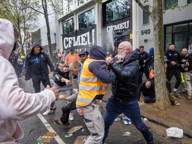 Two men brawl outside CFMEU headquarters on Monday. Picture: David Geraghty