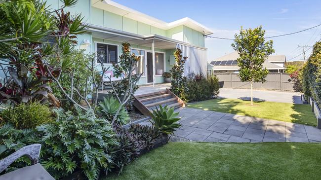 The Polly Palms used to be known by locals as the little blue house.