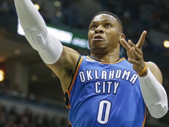 Oklahoma City Thunder's Russell Westbrook in for a lay-up against the Milwaukee Bucks during the first half of an NBA basketball game Tuesday, Oct. 31, 2017, in Milwaukee. (AP Photo/Tom Lynn)