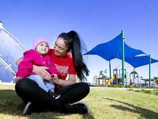 HAPPY FAMILY: Tiana and Heavenly Makai in Oakleigh Park in the Eden's Crossing estate in Redbank Plains. Picture: Renae Droop