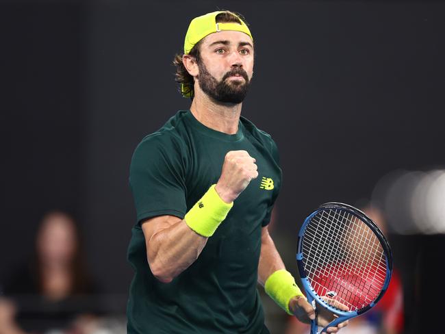 BRISBANE, AUSTRALIA – JANUARY 01: Jordan Thompson of Australia celebrates in his match against Alex Michelsen of the USA during day four of the 2025 Brisbane International at Pat Rafter Arena on January 01, 2025 in Brisbane, Australia. (Photo by Chris Hyde/Getty Images)