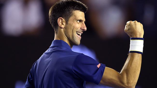 Novak Djokovic celebrates his win against Roger Federer at the Australian Open in 2016. Picture: AFP