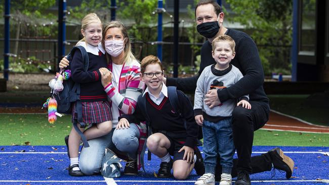 Happy days ahead: Kat and Paul Cheshire with their children Scarlett, 6, Harry, 8, and Tom, 3; the elder two will return to school on Monday. Picture: Aaron Francis