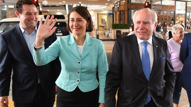 NSW Premier Gladys Berejiklian is joined by former prime minister John Howard (right) and Minister for Western Sydney Stuart Ayres (left) as they take to the streets in Penrith.