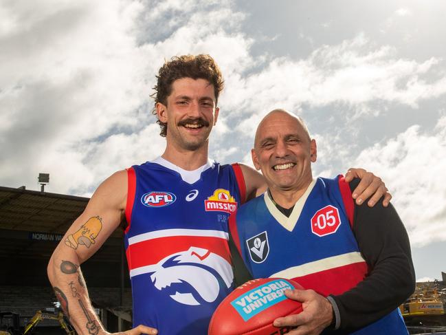 MELBOURNE, AUSTRALIA - AUGUST 01: Tom Liberatore and his dad Tony Liberatore poses for a photo during a Western Bulldogs AFL media opportunity at Whitten Oval on August 01, 2022 in Melbourne, Australia. (Photo by Darrian Traynor/Getty Images)