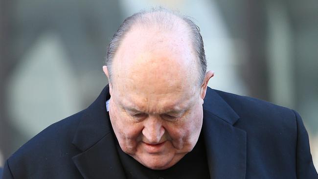 Archbishop Philip Wilson arrives at Newcastle Local Court in Newcastle, Tuesday, May 22, 2018. The Adelaide Archbishop is accused of concealing abuse in the NSW Hunter Valley region in the 1970s. (AAP Image/Peter Lorimer) NO ARCHIVING