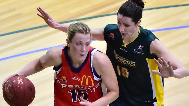 Sara Blicavs in action against Jacinta Kennedy. Picture: Derrick den Hollander