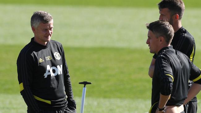 Manchester United Manager Ole Gunnar Solskjaer (left) with assistants Kieran McKenna (front right) and Michael Carrick at training in Perth on Tuesday. Picture: AAP