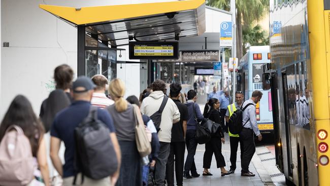 Commuters wait to board the popular B-line express bus from Mona Vale to Wynyard. Picture: Brendan Read